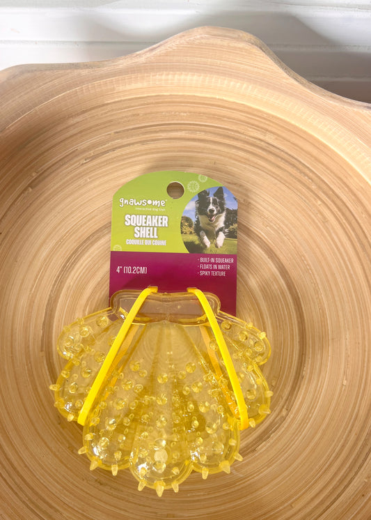 Squeaker Shell Gnawsome 4" water play dog toy yellow